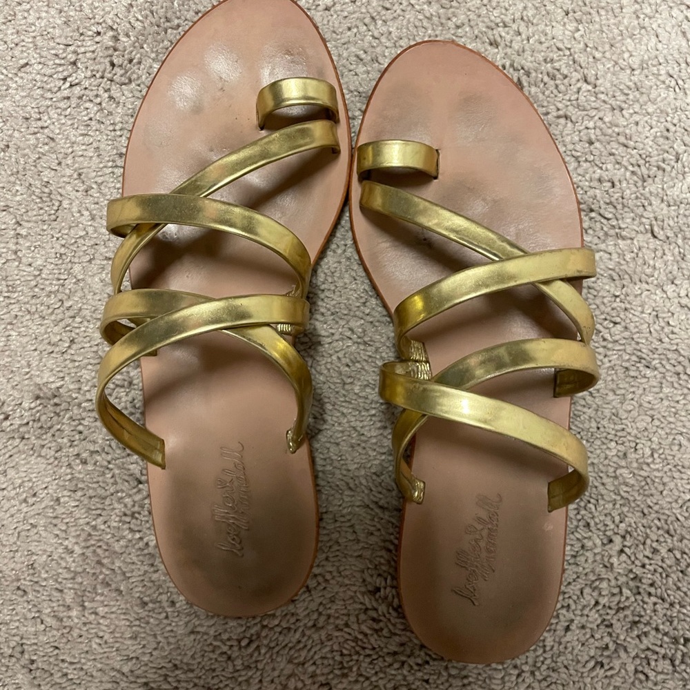 Loefflar Randall gold leather slides. True to size 7.5. Good condition.